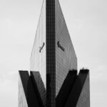Symmetrical high office building in a city business district