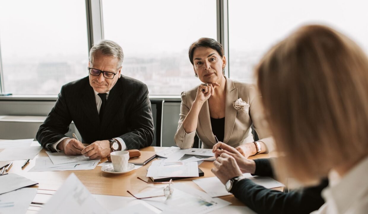 Business professionals in discussion during a meeting in a modern office