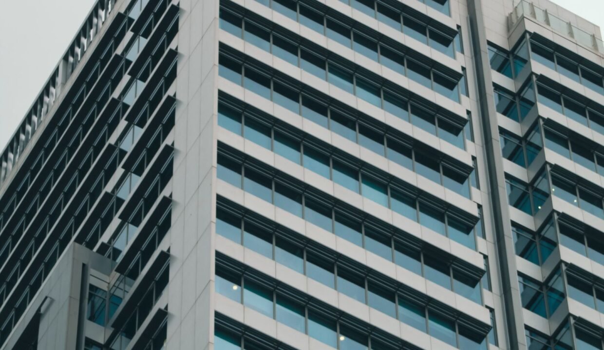 Low angle view of a modern glass facade office building