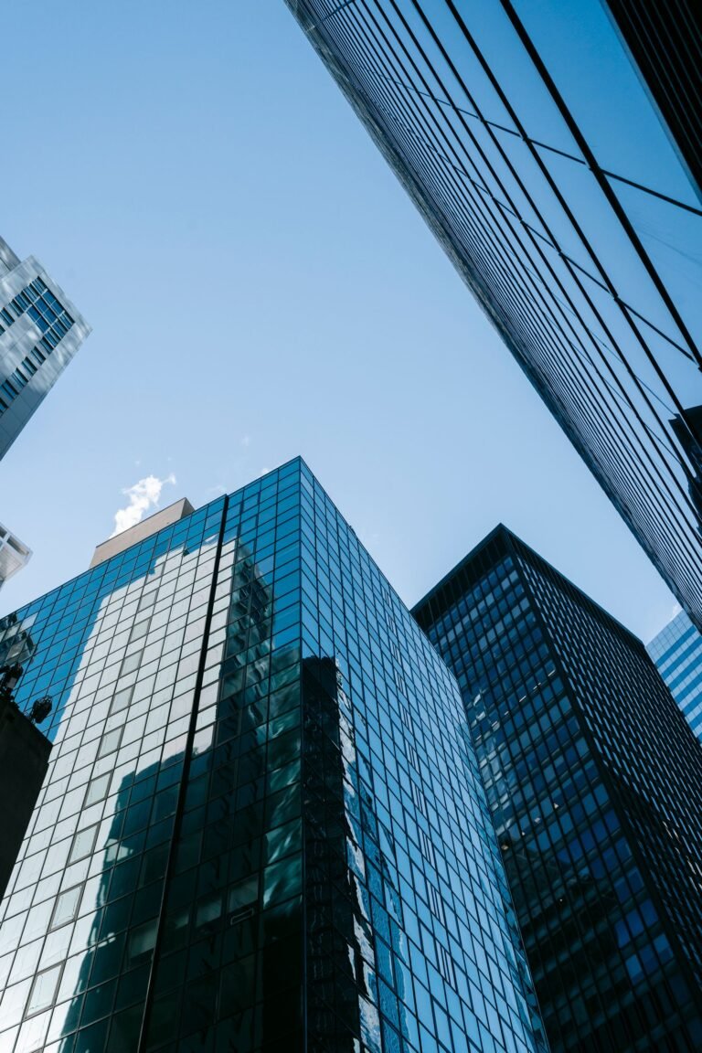 Mirrored high-rise commercial buildings representing Islamabad commercial development