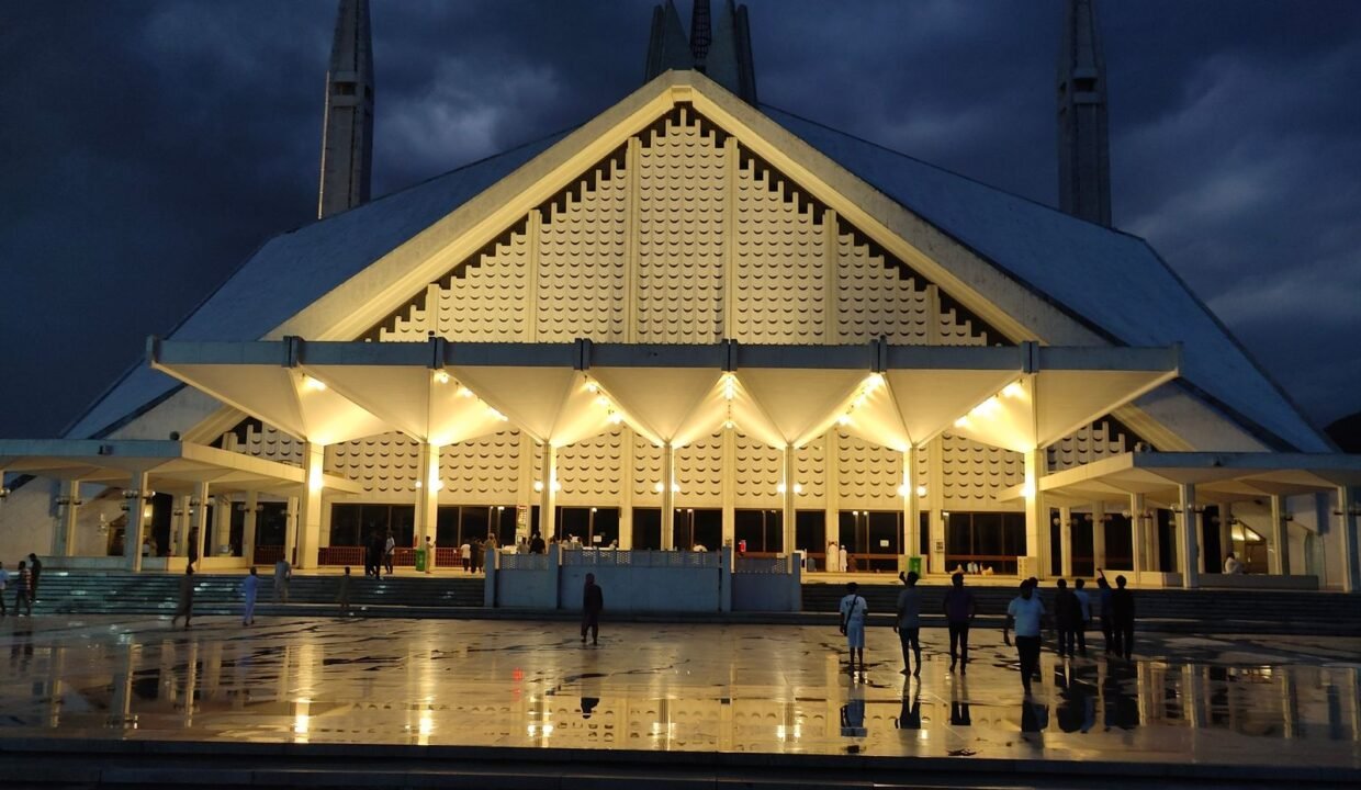 Faisal Mosque lit at night in Islamabad, cover image for the SCO summit hotel shortage guide