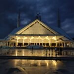 Faisal Mosque lit at night in Islamabad, cover image for the SCO summit hotel shortage guide