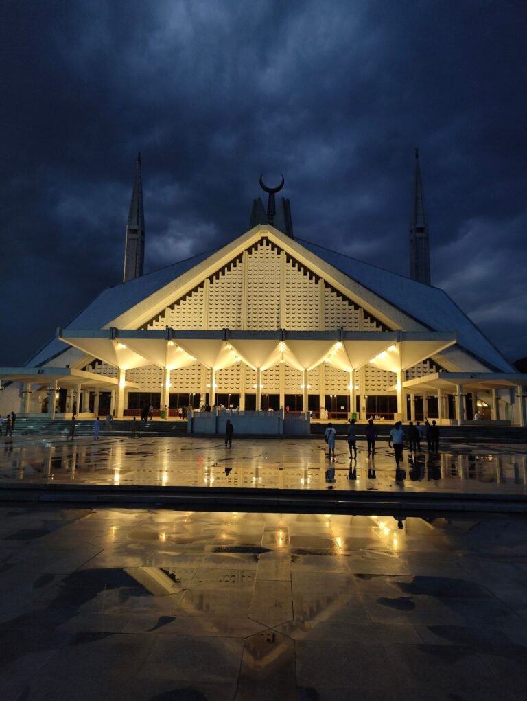 Faisal Mosque lit at night in Islamabad, cover image for the SCO summit hotel shortage guide