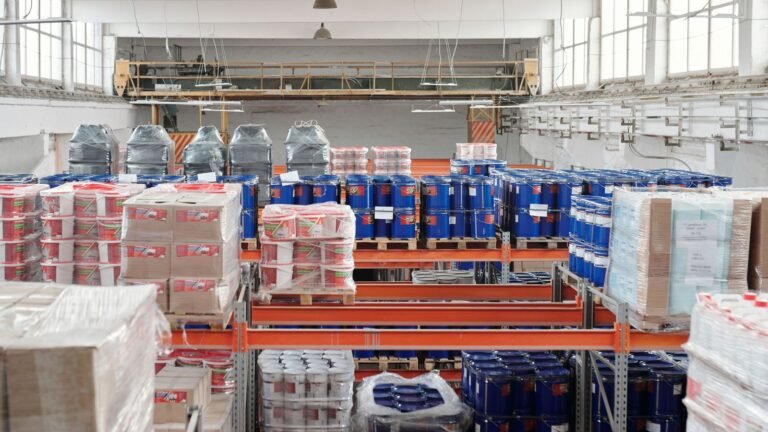 Large warehouse interior with organized goods on shelves